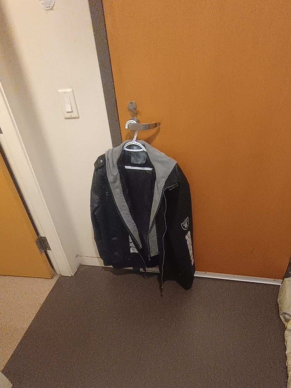 Men's Black Hooded Raiders Jacket with Gray Lining